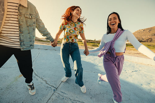 Friends having fun outdoors and savoring joyful moments together
