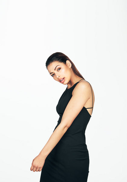 Portrait of a young woman in black dress