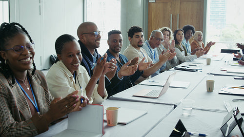 Business people applauding an event
