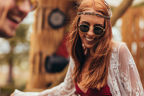 Hippie woman dancing at music festival