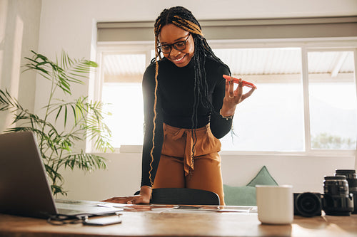 Female photographer communicating with her clients