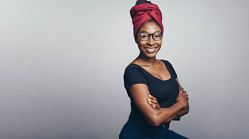 Smiling african woman in a headwrap