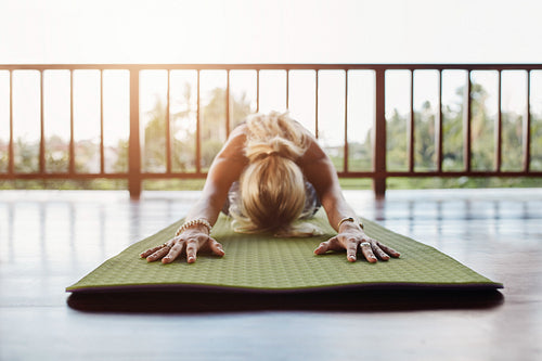 Fitness female performing yoga