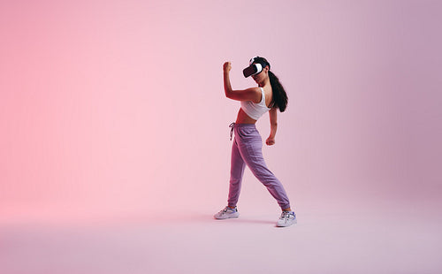 Female gamer exploring a virtual reality game