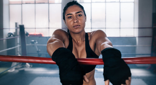 Female boxer inside a boxing ring