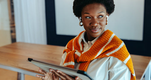 Successful African entrepreneur with tablet