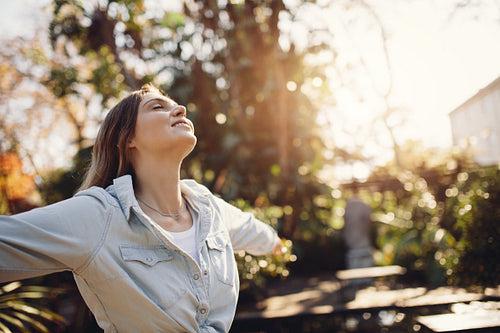 Woman at park enjoying fresh air
