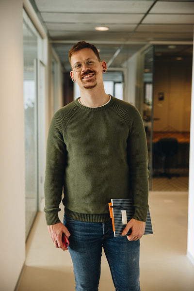 Successful businessman standing in office