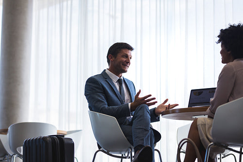 Business people waiting at airport lounge