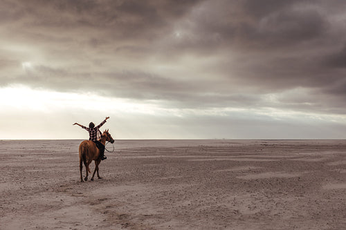 Woman enjoying horse riding
