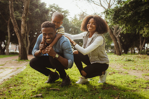Happy african family enjoying at the park