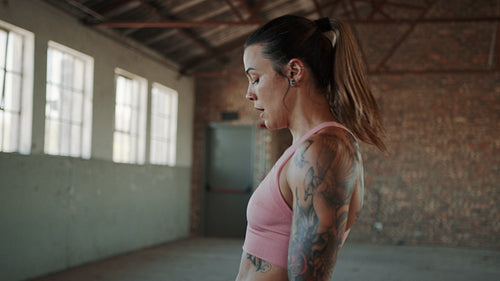Woman taking a break after workout in gym