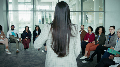 Speaker addressing business group meeting
