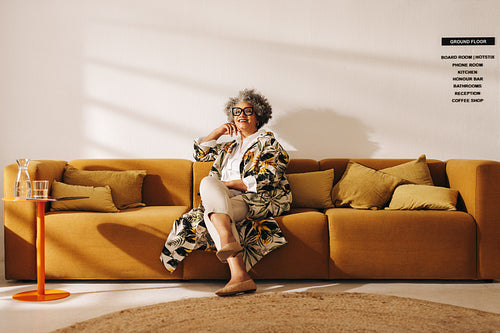 Senior businesswoman sitting in a coworking office