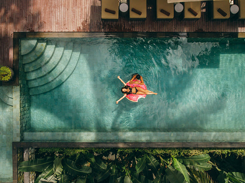 Couple on vacation enjoying in resort pool