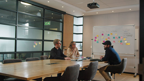 Group of business people having a discussion in a boardroom