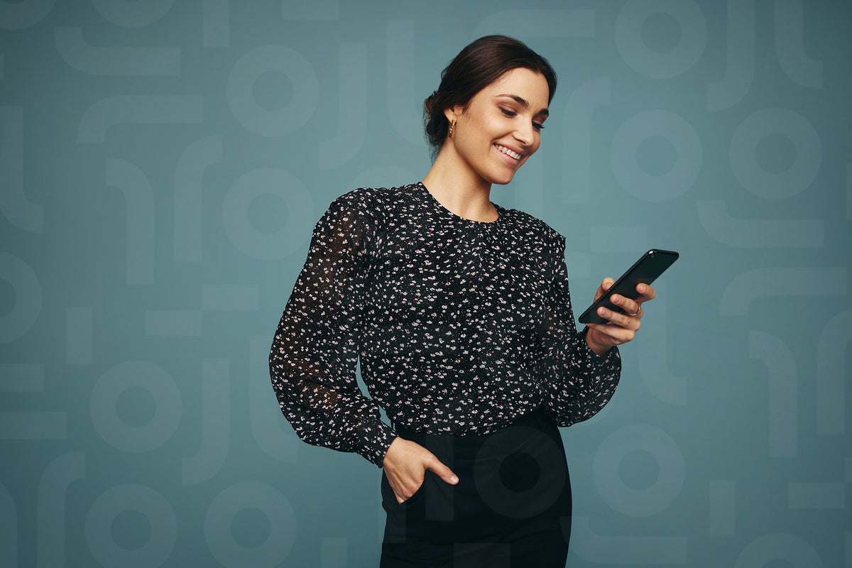Woman sending a text message in a studio – Jacob Lund Photography Store ...