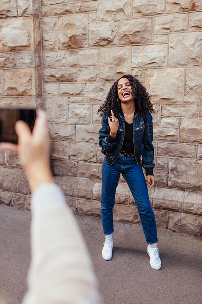 Woman posing for photos outdoors