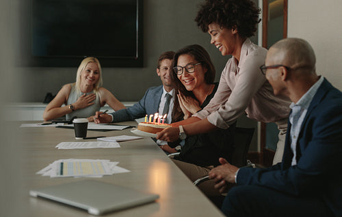 Birthday celebration of female colleague in office