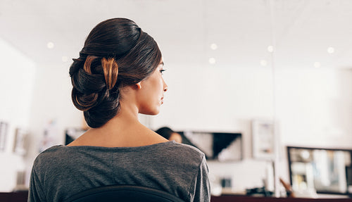 Woman in fashionable hairdo at a salon