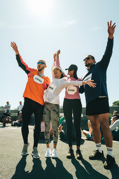 Friends celebrating together after a successful community run