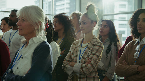 Conference attendees listen to a presentation