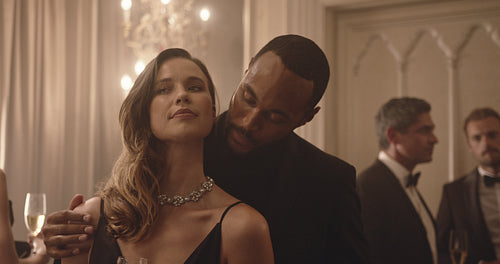 Couple dancing romantically at a party