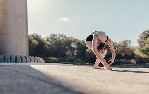 Female ballet dancer practicing dance moves