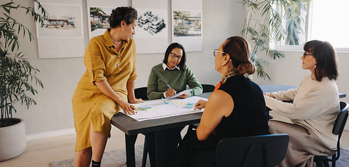 Group project management meeting fostering collaborative work environment in a modern office