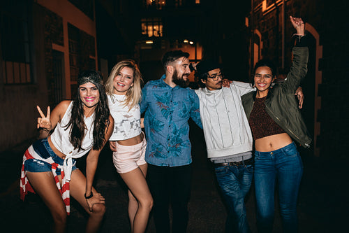 Young group of friends having fun outdoors