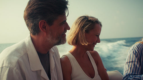 Happy family on a luxury yacht cruise during a beautiful sunny day vacation