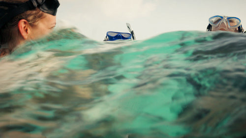 Family enjoying a relaxing snorkeling adventure on vacation