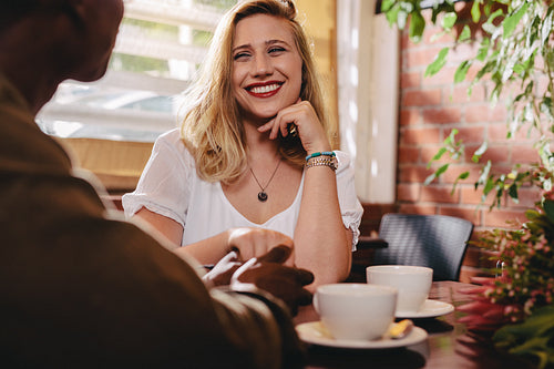 Dating couple spending qualtiy time at coffee shop