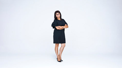 Woman standing with arms crossed