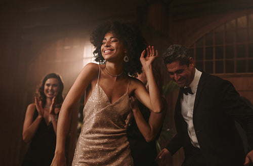 Attractive young woman dancing at a nightclub