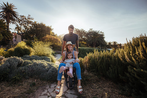 Family enjoying a ride in wheelbarrow