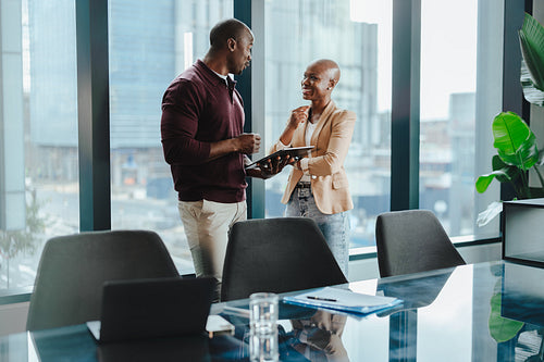 Successful business meeting in a modern office with a stunning city view