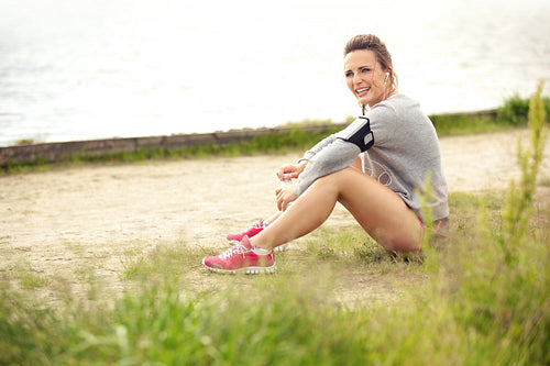 Happy Female Runner Resting