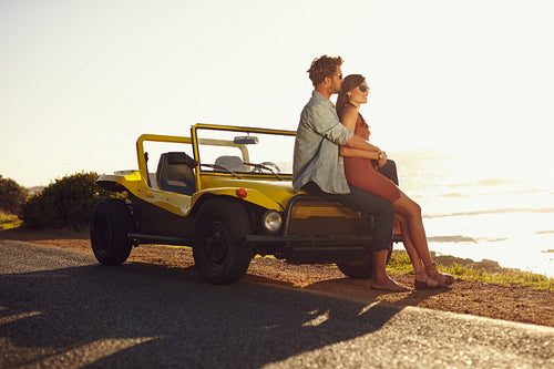 Couple enjoying the beach view