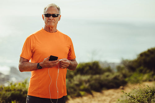 Portrait of a fitness person standing outdoors