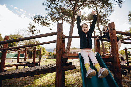 Little girls enjoying themselves at the playground