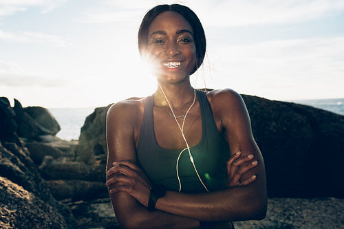 Healthy woman relaxing after workout outdoors