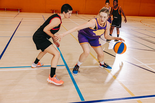 Game face on: Female basketball players in the heat of competition