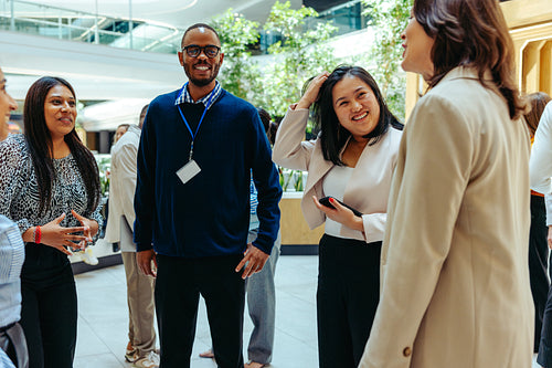 Casual business meeting in a modern office courtyard