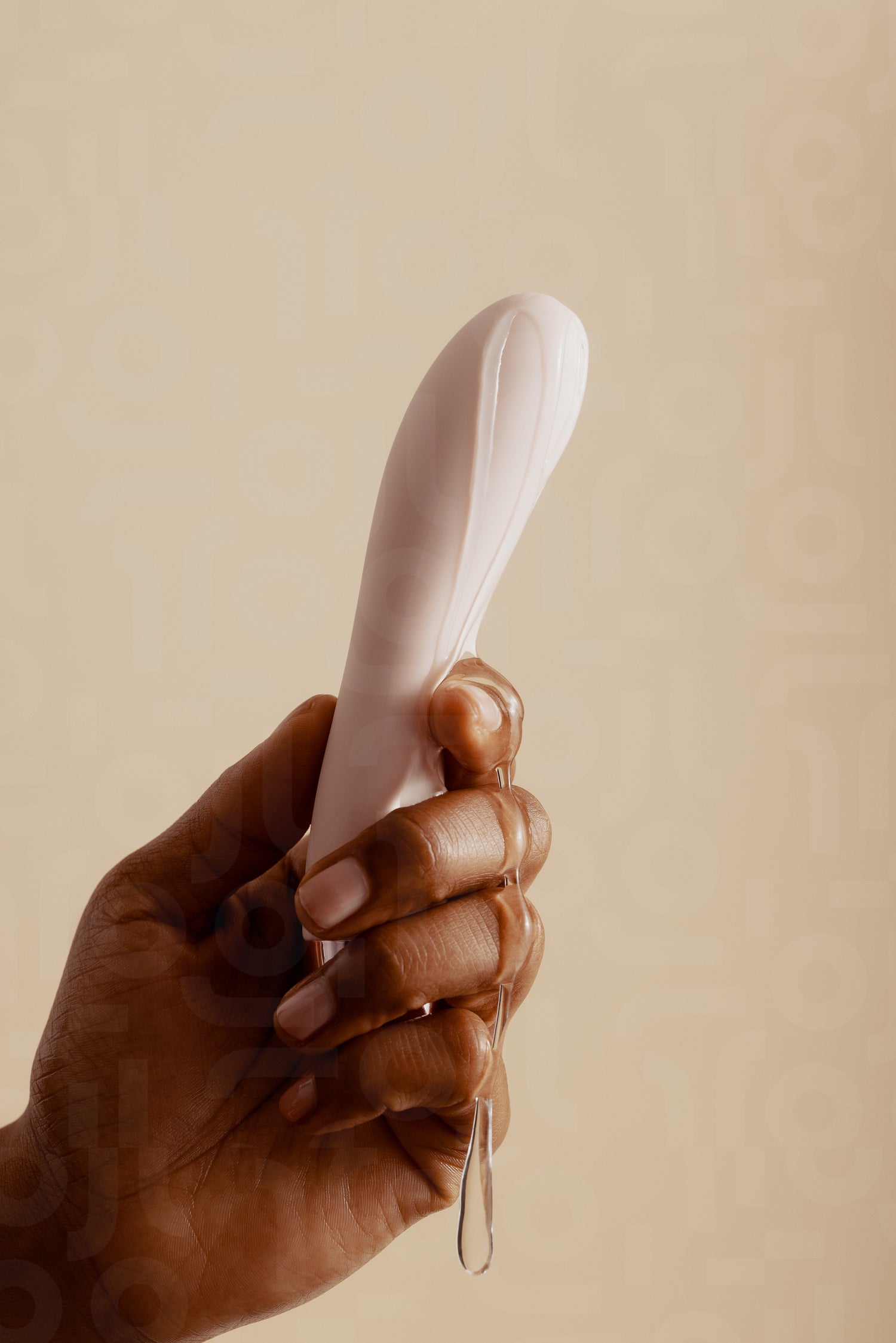 Woman's hand holding a lubricated sex toy for self-pleasure Jacob Lund Photography Store- premium stock photo Woman's hand holding a lubricated sex toy for self-pleasure Jacob Lund Photography Store- premium stock photo