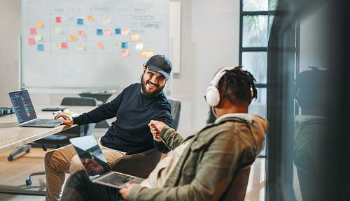 Successful collaboration: Creative business team fostering ideas in productive boardroom meeting