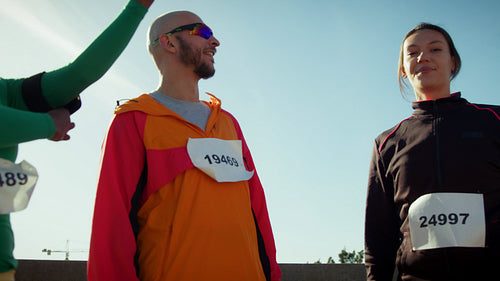Happy group of runners celebrating