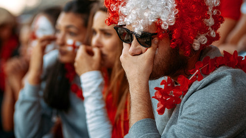 Unhappy and frustrated football fans at the stadium