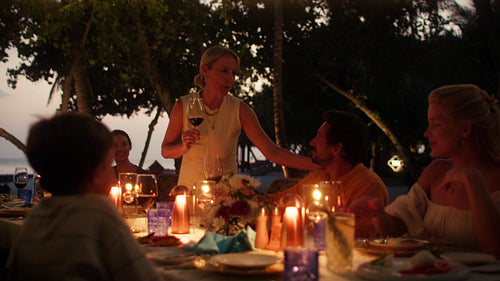 A memorable family vacation dinner with friends at a luxurious island resort