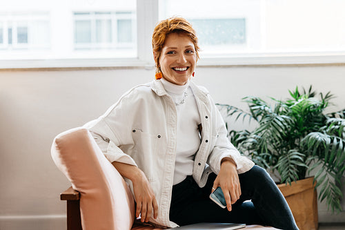 Professional female in a modern freelance co-working space